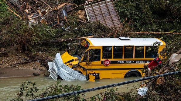 A school bus sits in a creek following heavy rains near the city of Jackson