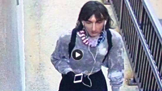 The suspect disguised himself as a woman to escape alongside fleeing onlookers, police say