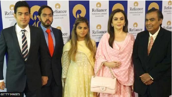 Mukesh Ambani (right) with his wife and three children