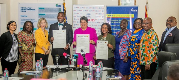 US Ambassador Virginia Palmer, NHIA CEO Dr. Benard Oko Boye with the management board of NHIA, Member of Parliament for Atiwa East Constituency and Deputy Minister of Finance, Abena Osei-Asare at the signing of the partnership.