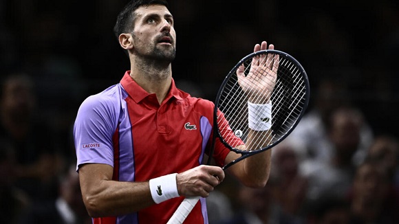 Djokovic fights virus to win in Paris; exhausted Sinner slams