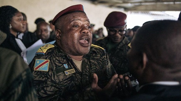 Col Mike Mikombe was accused of ordering his officers to open fire on anti-UN protesters