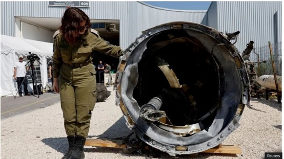 Israel's military displays what it says is an Iranian ballistic missile retrieved from the Dead Sea.