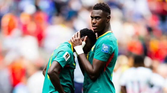 Monaco midfielder Lamine Camara needed comforting by team-mates after giving away the extra-time penalty which saw Senegal knocked out of the World Cup