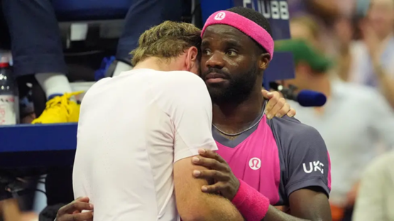 Frances Tiafoe (right) hugged compatriot Alex Michelsen at the net, with the two good friends off the court