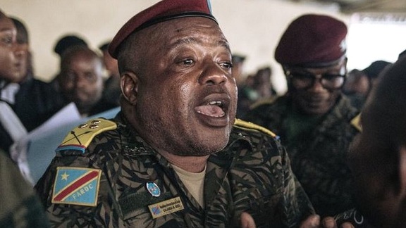 Col Mike Mikombe was accused of ordering his officers to open fire on anti-UN protesters