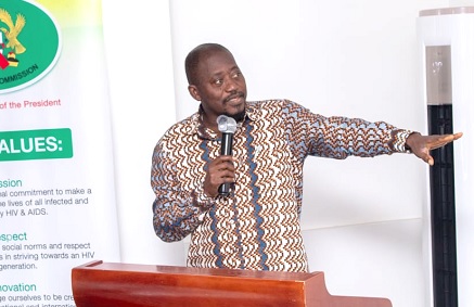 Dr Fred Nana Poku, Director, Technical Services of the Ghana AIDS Commission making a presentation at the capacity building programme for media personnel