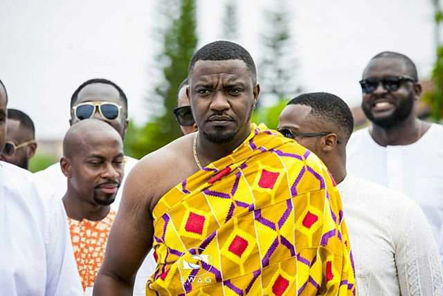Kente photos of John Dumelo on his wedding day that are too good to ignore