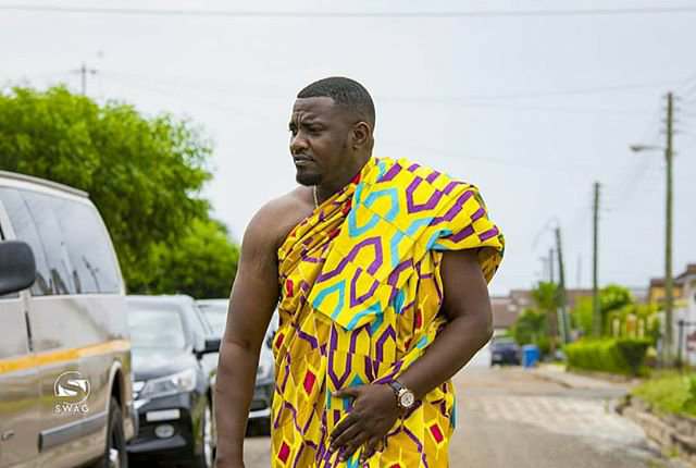 Kente photos of John Dumelo on his wedding day that are too good to ignore