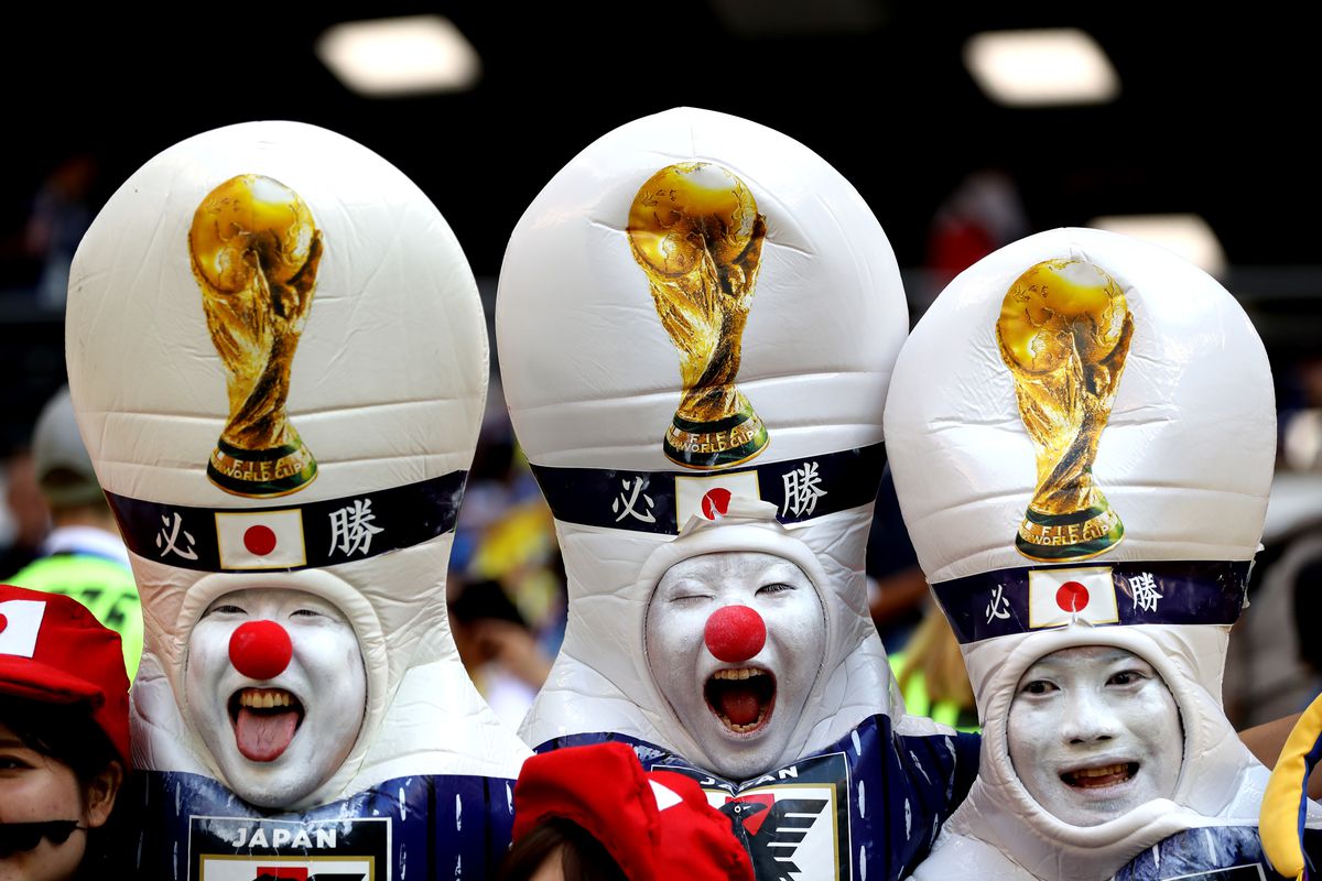 Happy Japanese fans after their 2-2 with Senegal