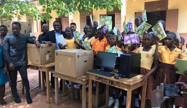Betenase students receive computers from donors aside Microsoft