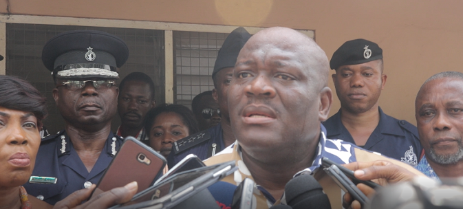 Deputy Minister of Interior addressing the media at the Kwabenya Police Station
