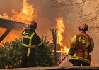 Firefighters battle flames in Lège-Cap-Ferret, south-western France