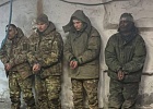 Captured Russian soldiers and an African mercenary. Illustrative photo: ArmyTV