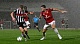 Grimsby's Cameron Gardner and Manchester United's Harry Maguire battle it out at Blundell ParkMan Utd suffer humiliating Carabao Cup exit to League Two side Grimsby